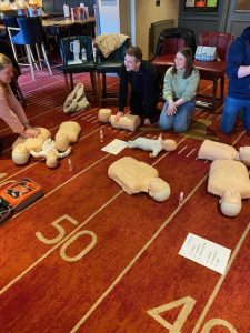 Parents learning on a Baby First Aid Course Wilmslow 
